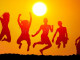 silhouettes-happy-teenagers-jumping-high-26956565