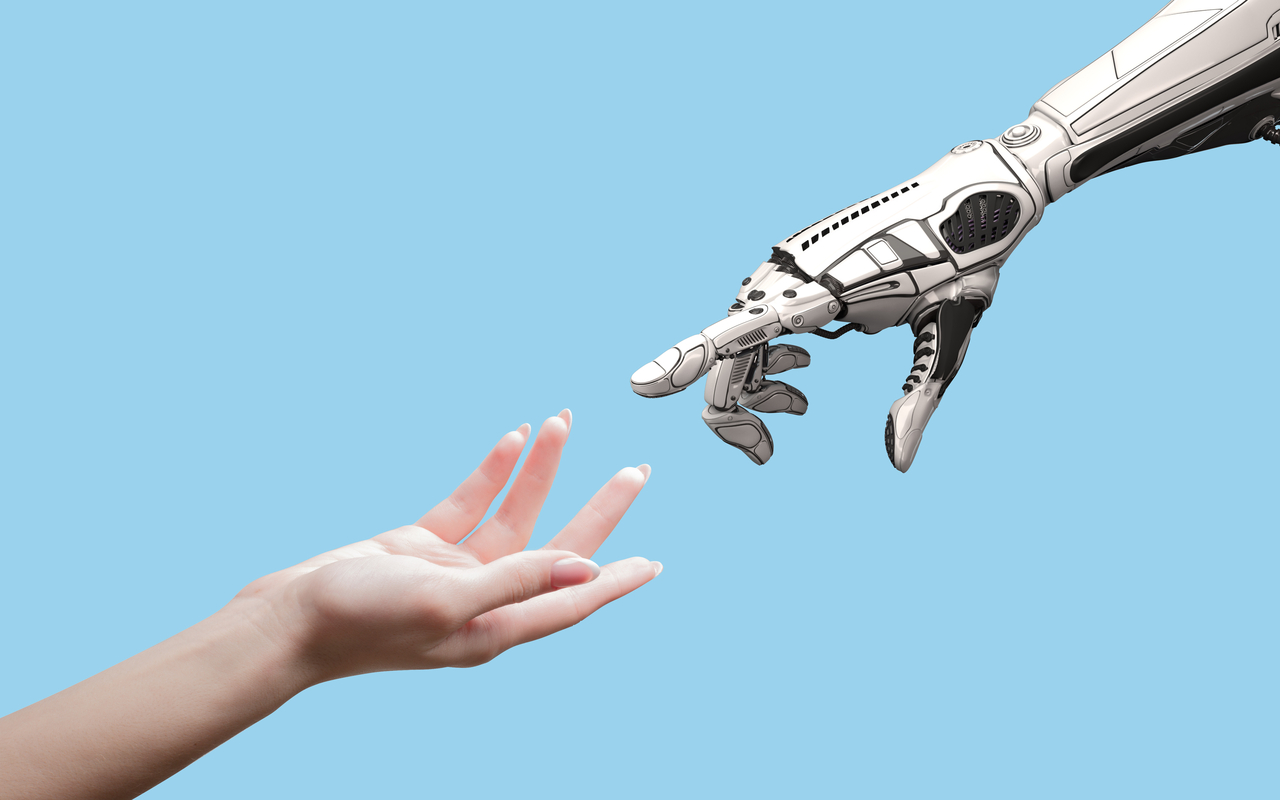 human-hand-and-robot-hand-reaching-for-one-another