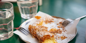 Bougatsa, greek traditional cream pastry served with sugar and c