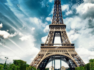 stock-photo-paris-la-tour-eiffel-tower-view-from-champs-de-mars-garden-at-summer-sunset-1408265933