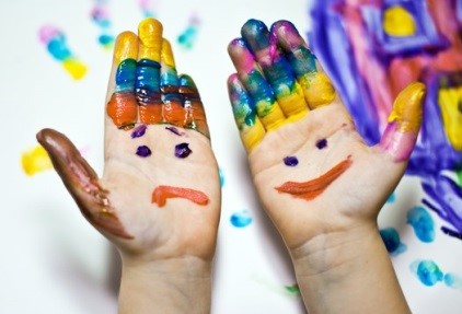 hands with painted faces