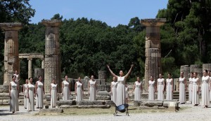 Greek actress Ino Menegaki prepares to light the Olympic Flame during a dress rehearsal for the London 2012 Olympic Games at the site of ancient Olympia in Greece