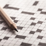 depositphotos_114720940-stock-photo-crossword-puzzle-and-pencil
