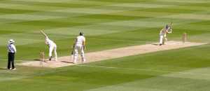 Shaun Pollock of South Africa bowls to Michael Hussey of Australia during the 2005 Boxing Day Test match at the Melbourne Cricket Ground