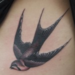 Swallow-Tattoo-Designs-on-sleeve