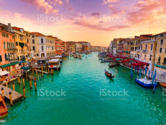 Colorful sky during sunset on romantic eve in Venice, Italy